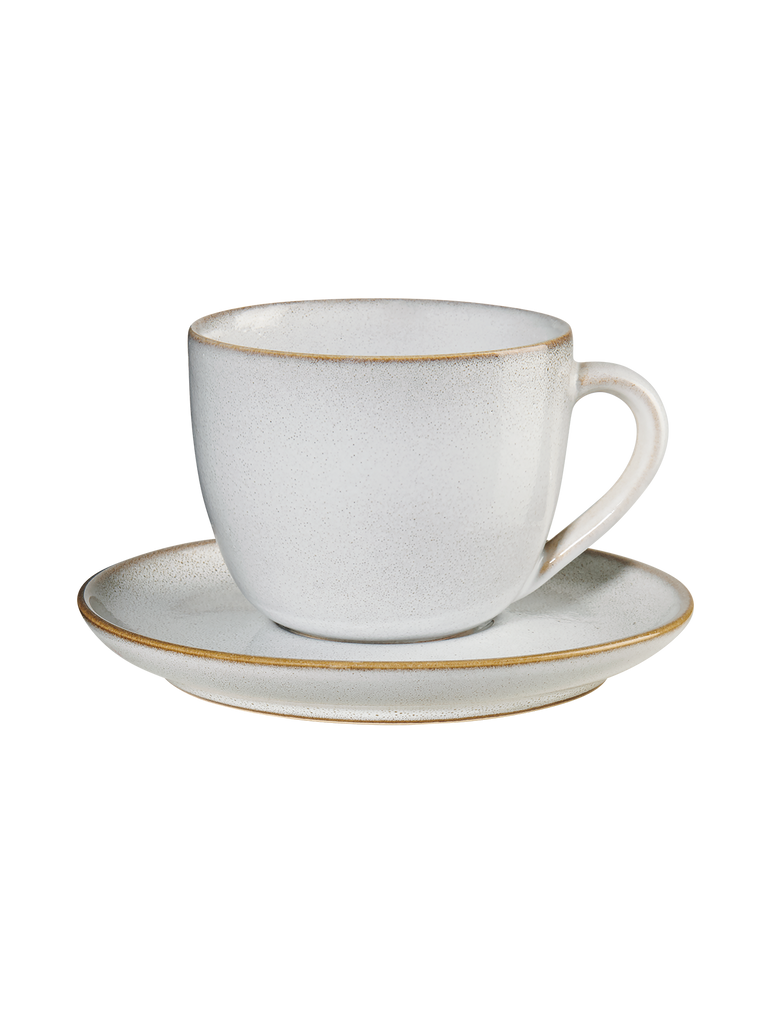 cappuccinotasse mit unterteller, sand